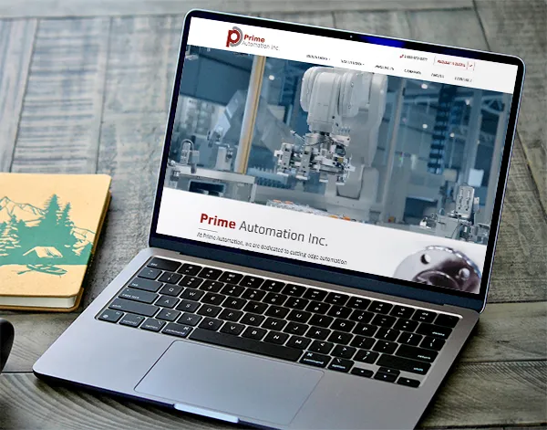 Prime Automation website on a laptop